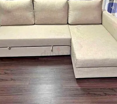 Comfortable Beige L-Shaped Sofa Bed with Pull-out Feature