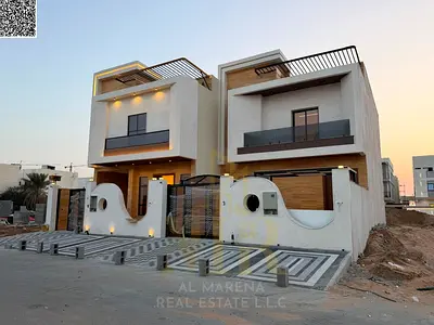 Luxury townhouse villa for sale in Al-Haliyo 2 on Azha Roundabout | Elegant stone facade | 4 master bedrooms | Modern design with double-height ceilin