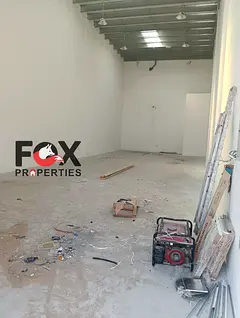 Warehouse for annual rent in Al Jurf Industrial Area 2. Price reduced to 125,000; 4 installments; 20