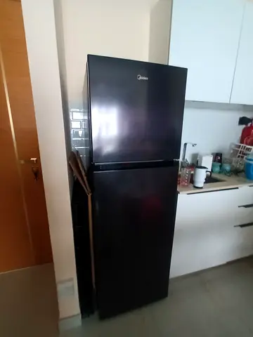 Two-door Black Refrigerator - Good Condition