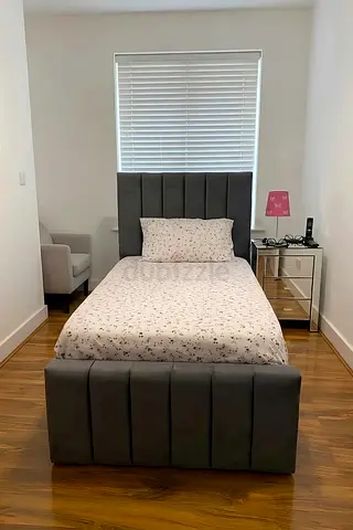 Single upholstered bed with padded headboard and footboard - Grey