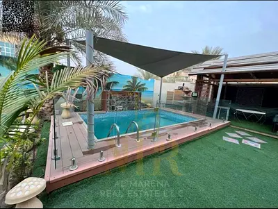 A villa with all electricity, water and air conditioning fees included, on the main street, ready to move in, in the most prestigious areas of Ajman.