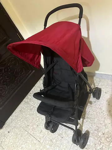 Red lightweight umbrella stroller - good condition