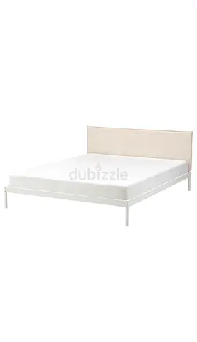 White metal king bed with upholstered headboard - IKEA bed frame