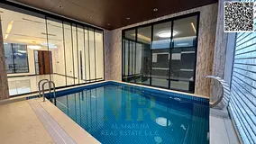 A modern villa in Al Yasmin, elegant design and thoughtfully planned spaces in a sophisticated style