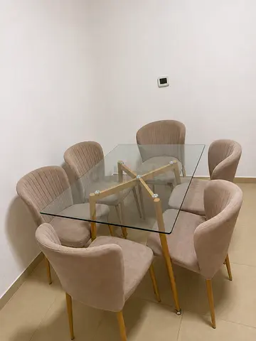 Glass Top Dining Table with 6 Beige Upholstered Chairs