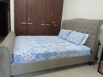 Upholstered King Size Bed with Tufted Headboard and Footboard - Good Condition