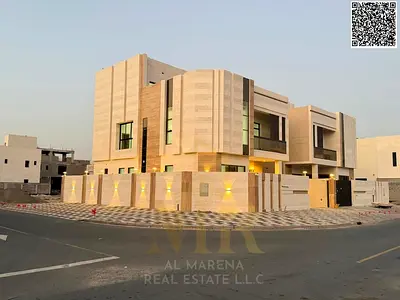 Luxury corner villa for sale in Al Bahia, two floors and a roof, price includes registration fees