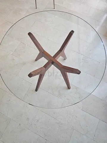 Round glass dining table with wooden cross base - 120cm