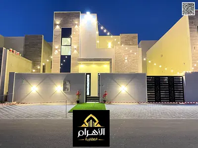 Villa for sale, including registration and ownership fees, near all services, close to Sheikh Mohammed Bin Zayed Road, on a main street, very prime lo