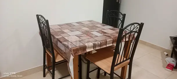 4-seater dining table with metal chairs - good condition