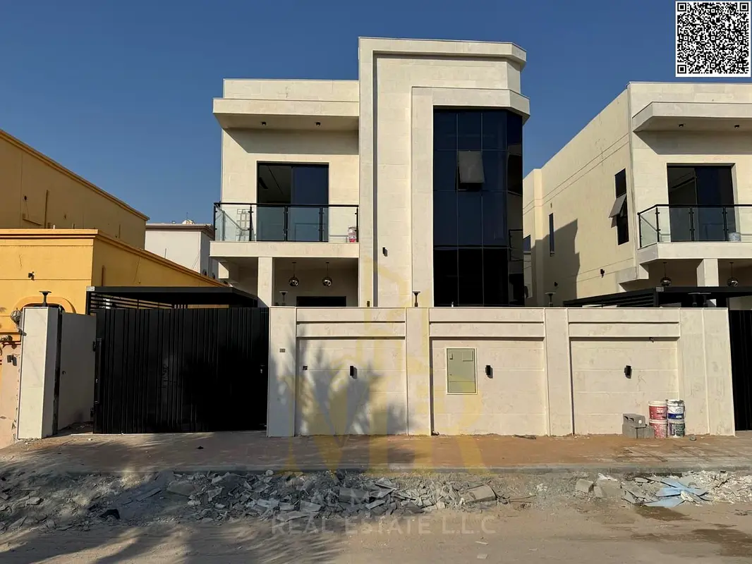 Villa for sale in Al Muwaihat 1 area, behind Nesto, price includes electricity, water, and air conditioning. Freehold ownership for all nationalities.