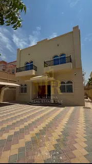 Villa for sale – Al Muwaihat 1, Ajman | Two floors and a roof terrace behind Nesto | Prime locatio