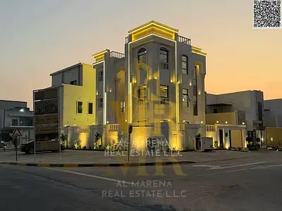 Luxury corner villa for sale in Al Zahia with a private pool and elegant modern design, price includes fees.