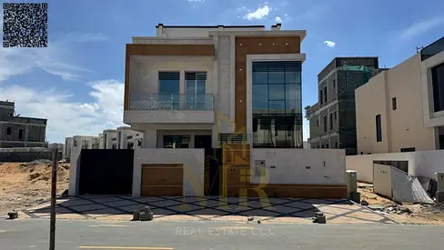 Turnkey villa, all fees included, on the main street, ready to move in, in the most prestigious area of ​​Ajman, freehold ownership for all nationalit