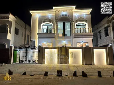 الفرصة السكنية النادرة – فيلا فاخرة مع روف في الحليو 2 – عجمان | 5 غرف نوم ماستر | مجلس وصالتين | بسعر شامل | تصميم مودرن ومساحة 3100 قدم امتلك فيلا ف