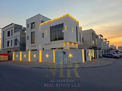 A distinctive villa in Al Yasmeen area - Ajman, two floors + roof, strategic corner location, including water, electricity, and air conditioning.