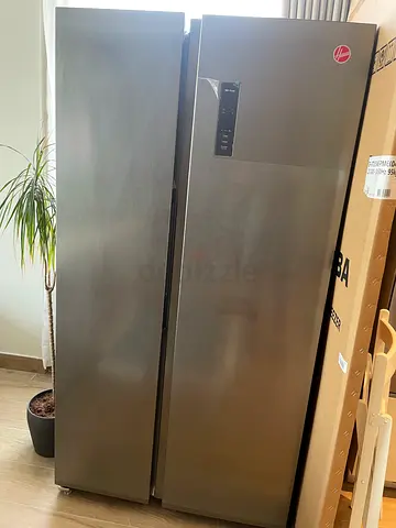 Hoover model:20HSB-M682-S , Two stainless steel tall freezers/refrigerators - market price 2099