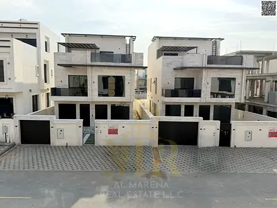 Luxury villa for sale in Al Bahia, two floors and a roof with a swimming pool, all-inclusive price, in one of the most prestigious areas of Ajman.