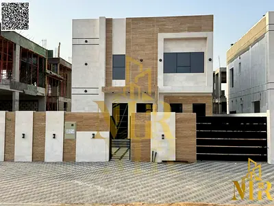 Modern villa with a rooftop terrace in Al Zahia, featuring high-end finishes, price includes registration fees.