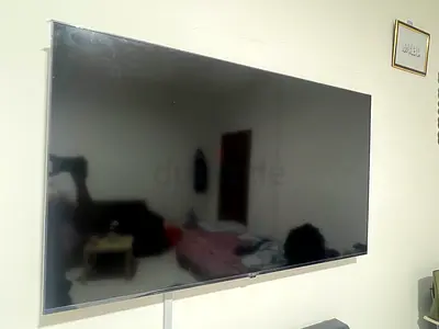 LG UHD 4K 55-inch LED Flat Screen TV - Good Working Condition. Light usage only by couple family.