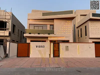 Luxury villa for sale in Al-Haliyo 2 with a private pool and rooftop terrace, price includes registration and ownership fees.