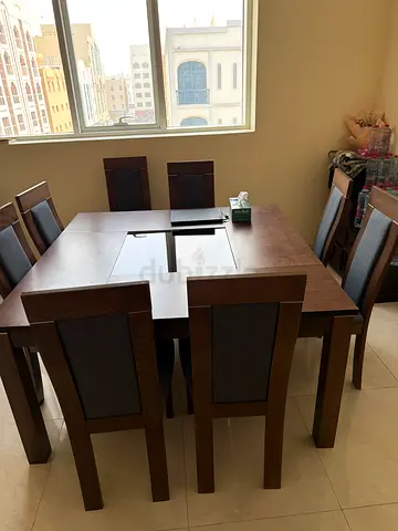 Solid Wood 6-Seater Dining Table with Upholstered Chairs - Good Condition