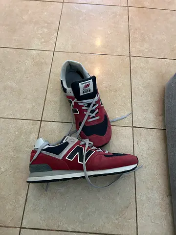 Red and navy New Balance sneakers - size uk 9 available