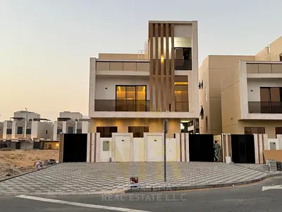 Luxury villa in Al Zahia, two floors and a roof, including registration and ownership fees and central air conditioning, freehold ownership.