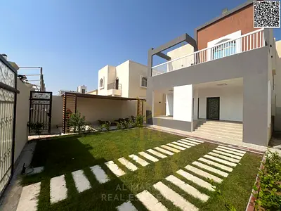 Luxury corner villa with 5 master bedrooms in Al Muwaihat 1, including electricity, water, and air conditioning, at a special price.