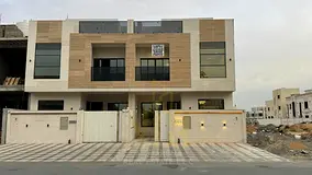 Luxury villa for sale in Al-Haliyo, two floors and a roof, including registration and ownership fees