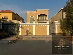 Spacious villa for annual rent in Ajman, 5 master bedrooms, hall, majlis, maid room, large yard, ful