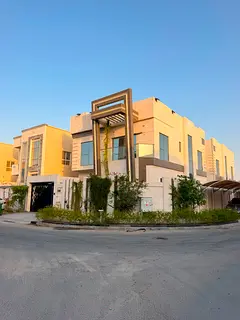 Luxury villa for rent in Al Yasmin, Ajman. 5 spacious bedrooms, beautiful rooftop terrace, and ample