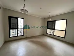 A spacious 2-bedroom apartment is available for annual rent in Al Qasba, Sharjah, featuring free par