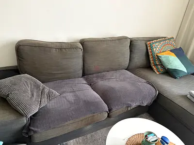 Grey L-shaped 3-seater Sofa with Recliner chair - Good Condition