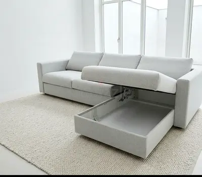 Built-In Storage Compartment
The sofa includes a generously sized storage compartment beneath the se