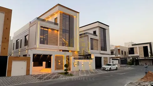 Modern three-story villa in Al Yasmin area, freehold ownership for all nationalities