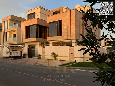 Corner villa with private pool and elevator in one of Ajman's most prestigious areas, on a main street, with all fees included.
