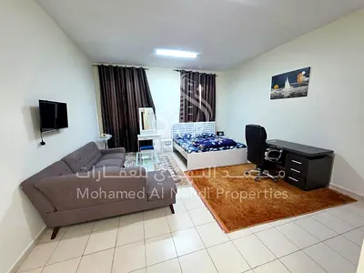 Furnished Studio | England Cluster X-04 | Balcony & Community View