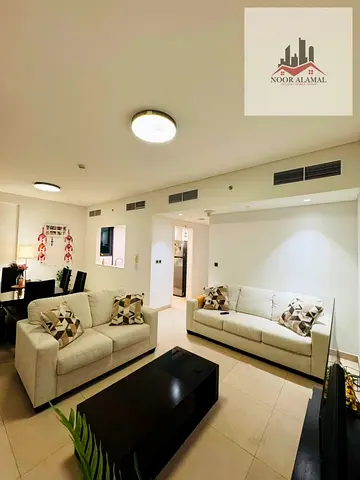 Sharjah, Aljada Compound: Fully furnished apartment (high-end finish) featuring two bedrooms, a living room, a kitchen, and three bathrooms. Price: 9,