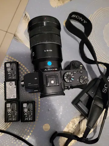 Sony a7s2 mirrorless camera with 18-105mm lens and extra batteries