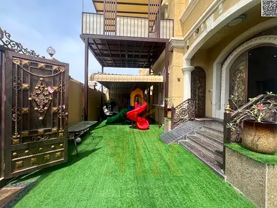 Luxury villa for sale in Al Muwaihat 3 | Area 3100 sq ft | Two floors + roof | 5 master bedrooms | Majlis and living room | Maid's room | Kitchen | In