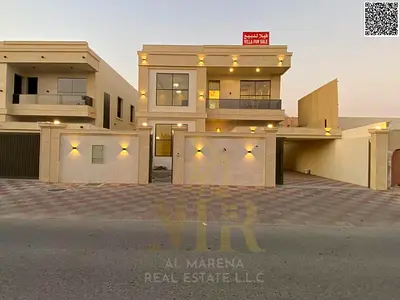 Luxury villa for sale in Al Rawda 2 | 5,000 sq ft | Two floors | 5 master bedrooms | Majlis and 2 living rooms | Modern kitchen | Maid's room | Large