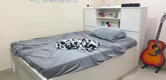 White wooden double bed with built-in headboard storage - good condition