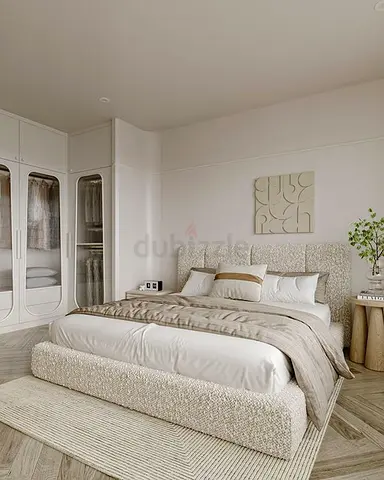 Queen upholstered bed with textured headboard and base - neutral beige