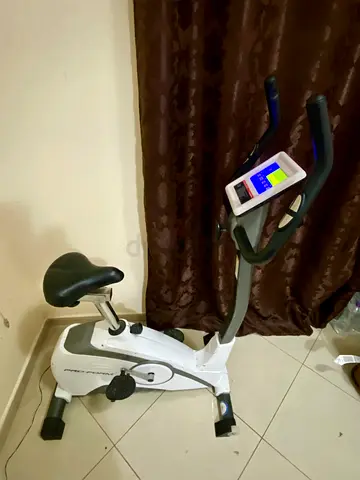 Used upright exercise bike with digital display