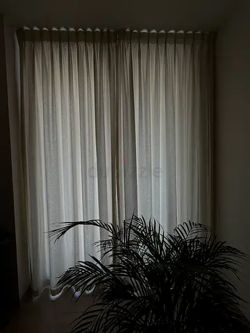 Light beige floor-to-ceiling curtains (pair) - good condition