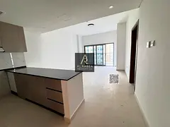High floor + open view + gym, pool and parking + 1192 sq ft + 20 minutes to Dubai