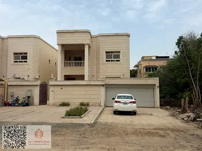Luxury Residential & Commercial Villa for Sale in Al Mowaihat 2 – Prime Location This luxurious villa is located in Al Mowaihat 2, second plot from A