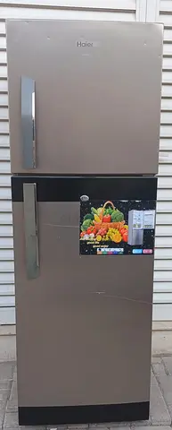 No frost Refrigerator HAIER, color is grey, condition is perfectly working